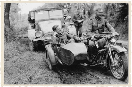 800px-Motorized Wehrmacht soldiers, motorcycle and Krupp Protze[1]